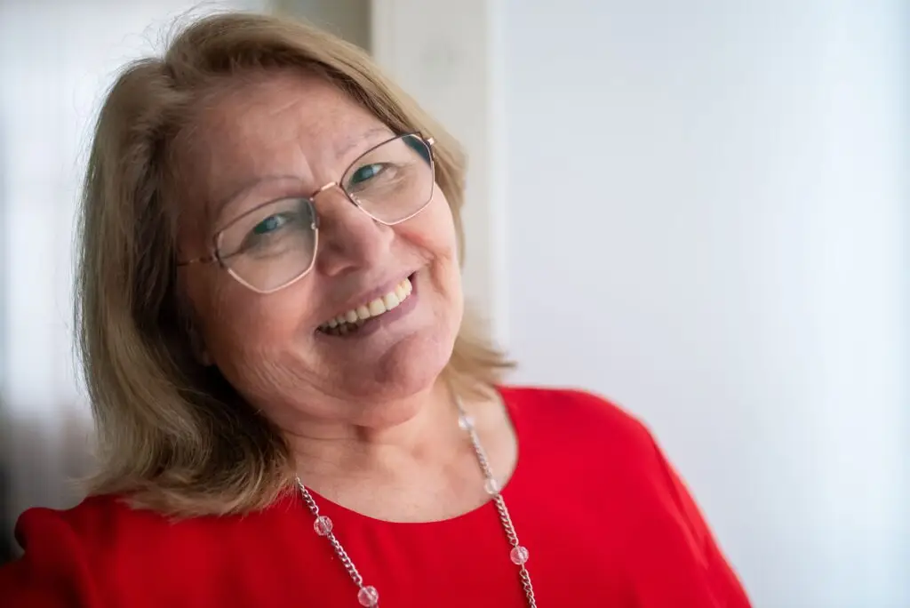 women in red shirt, holistic retirement planning